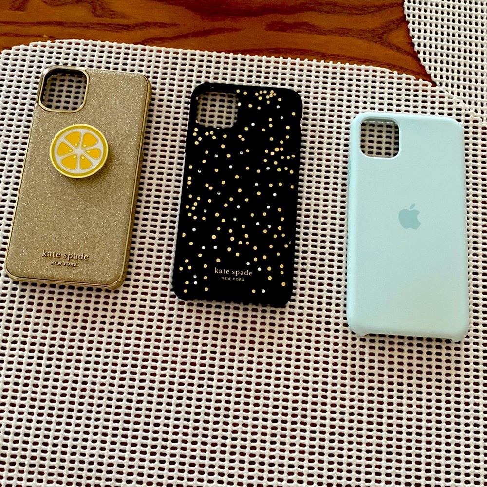 iPhone 11 Pro Max phone case. Two are Kate Spade and one is an original case
